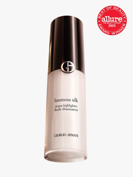 Armani Beauty Luminous Silk Acqua Highlighter in clear glass bottle with black cap on light gray background with red Allure Best of Beauty seal in the top right corner